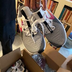 Nike Black and White Running Shoes with Pink Accents